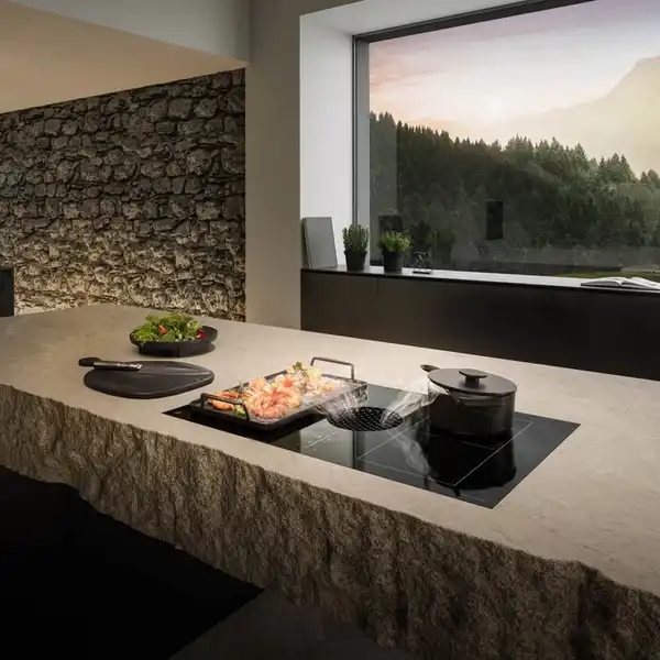 A kitchen featuring the JennAir JIDT836SBL induction cooktop.webp